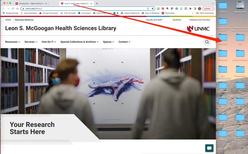 A screenshot shows a browser window with two tabs.  An arrow indicates that the McGoogan Library homepage tab should be dragged off of the window.