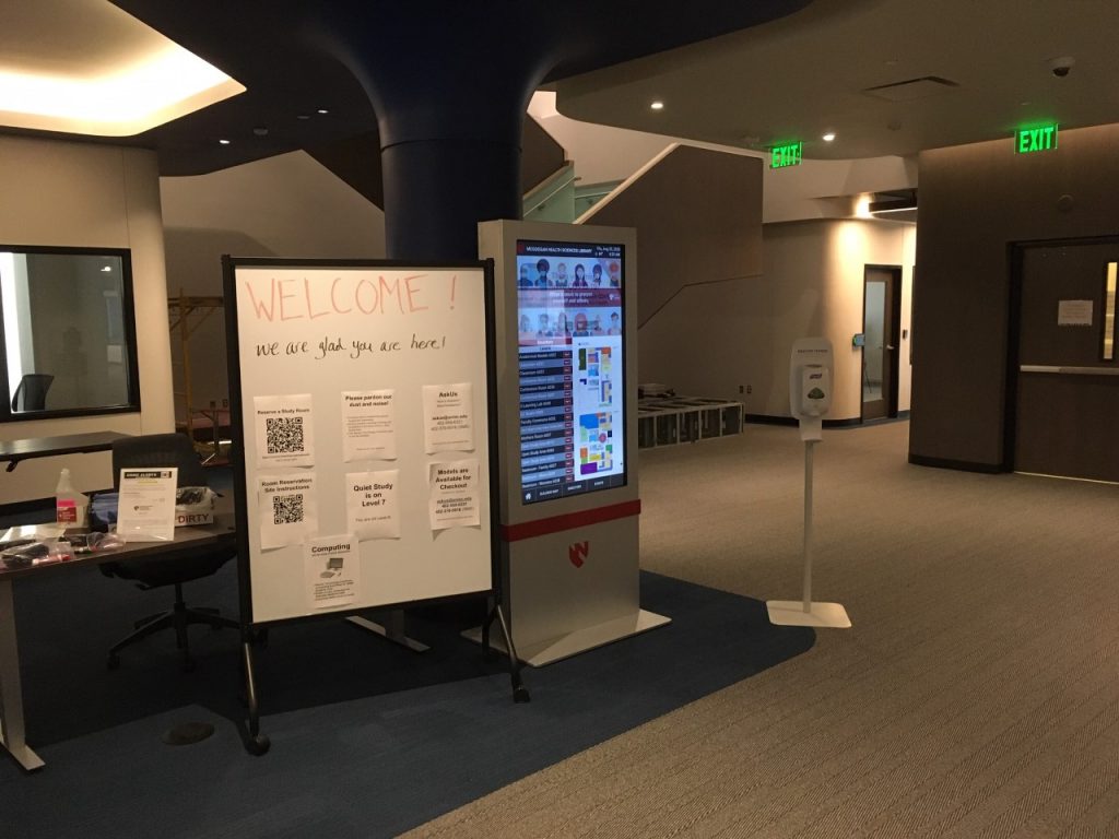 The mapping kiosk and cleaning station at the library entry.